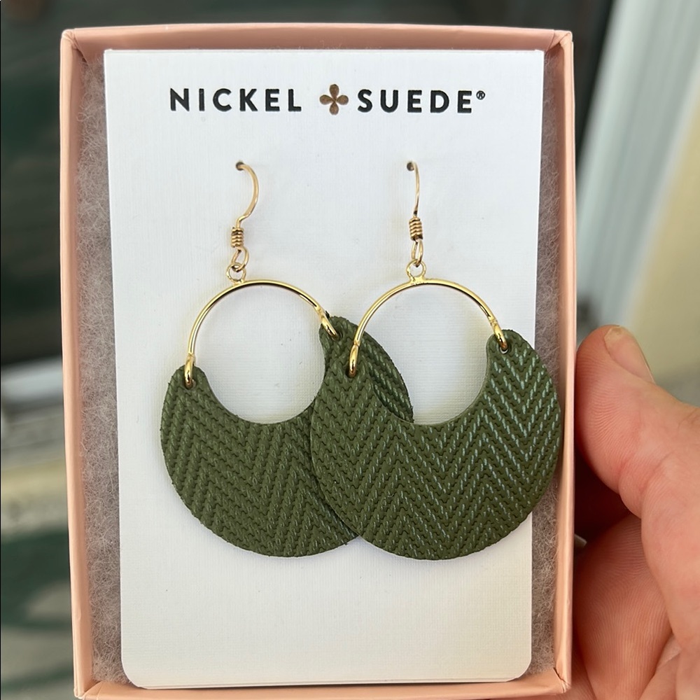Brand new nickel and suede green palm Nina earrings